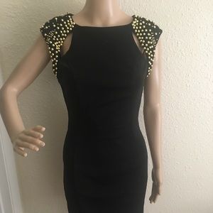 Fancy sleeveless dress in black with gold